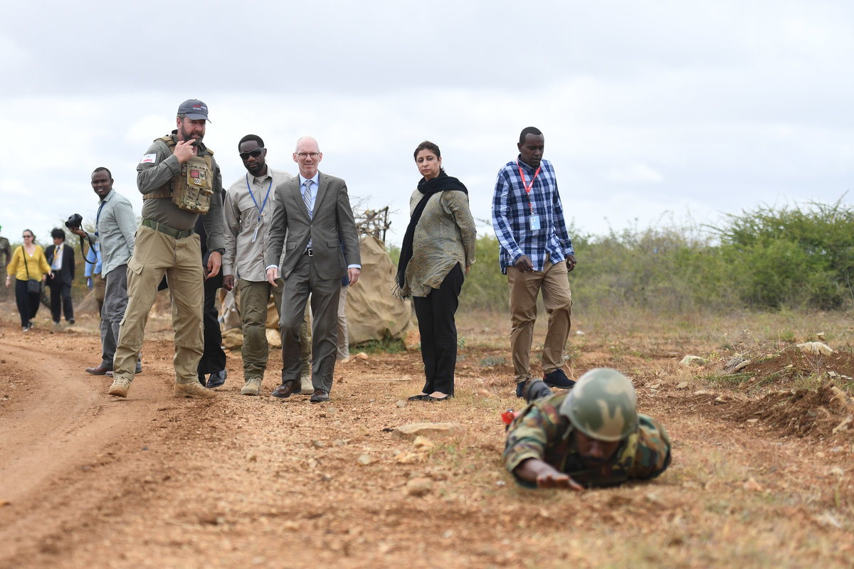 The UN Secretary-General’s Special Representative for Somalia, James Swan, receives a brief on Improvised Explosive Device (IED) clearance demonstration during a visit to Baidoa, South West State, on 18 July 2019. UN Photo / Abdikarim Mohamed