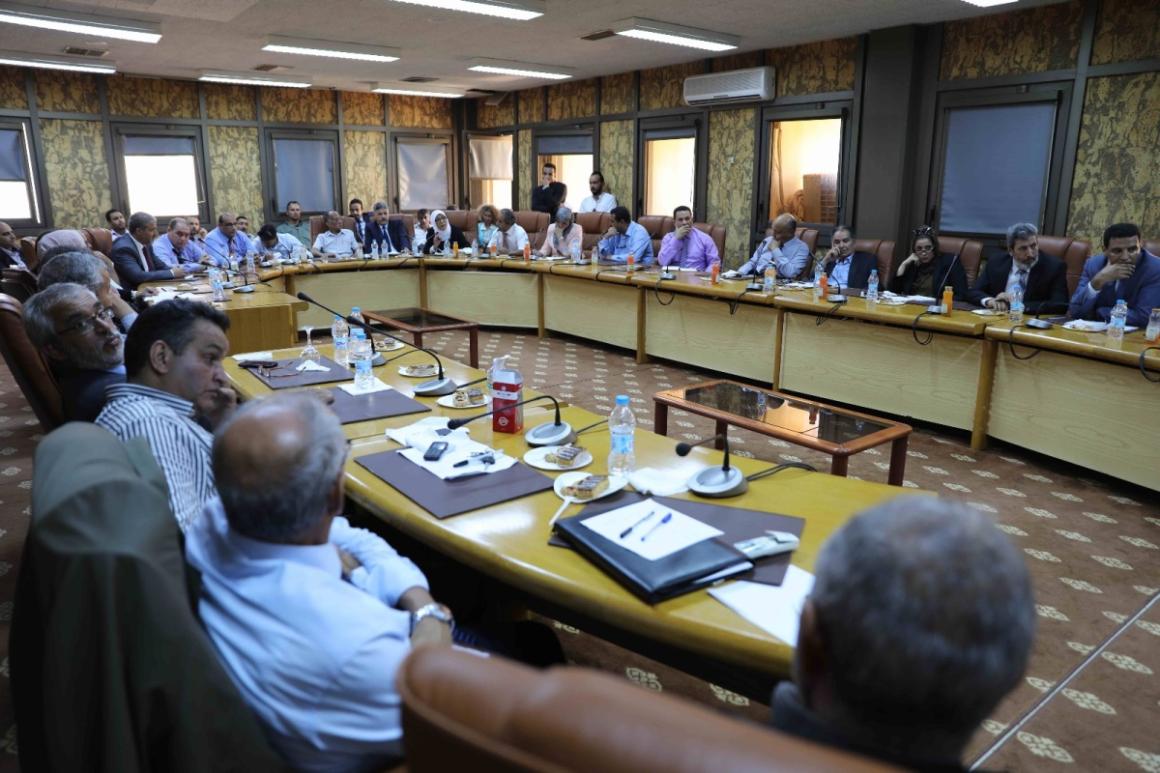 A Somali youth holds a peace message at a ceremony to mark International Youth Day, held in Mogadishu on August 12, 2017. Somali youths have become proactive in peace-building initiatives in various parts of the country.